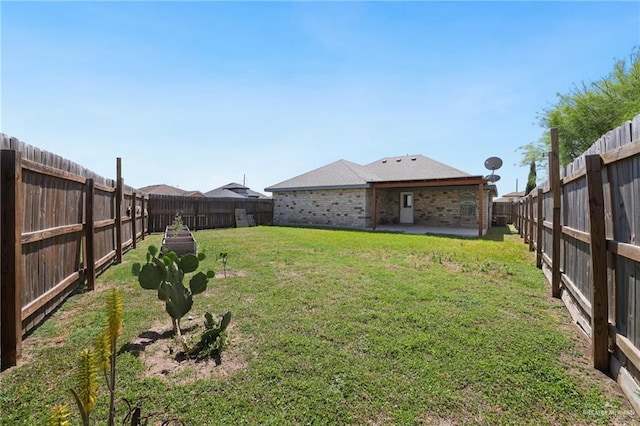 17231 Mandarin Ave, Harlingen, TX 78552 - view of yard featuring a patio area and a fenced backyard