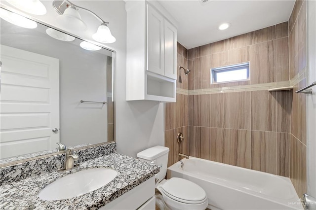 17231 Mandarin Ave, Harlingen, TX 78552 - bathroom with toilet, vanity, and shower / bath combination