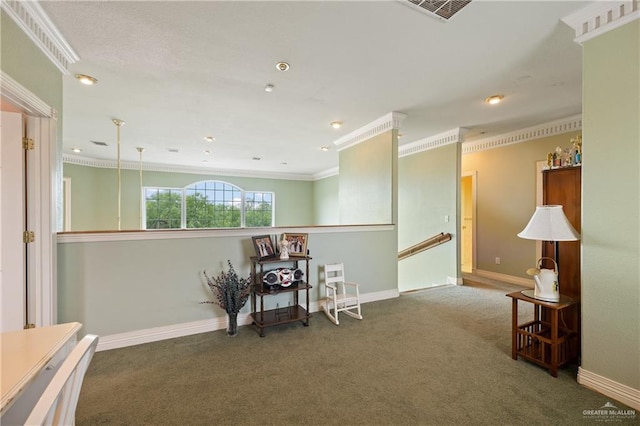 unfurnished room featuring ornamental molding and carpet