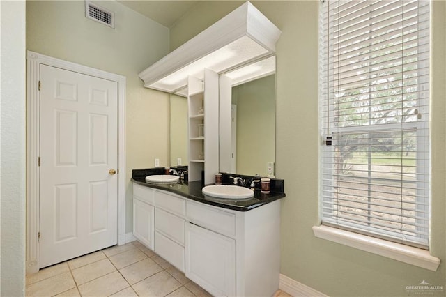 bathroom with vanity and tile patterned floors