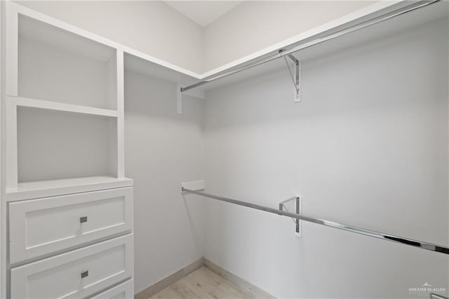 1216 N Lincoln Ave, San Juan, TX 78589 - walk in closet with light wood-style floors