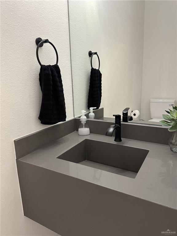 3108 E Kennedy Ave, Alton, TX 78573 - half bath with toilet and vanity