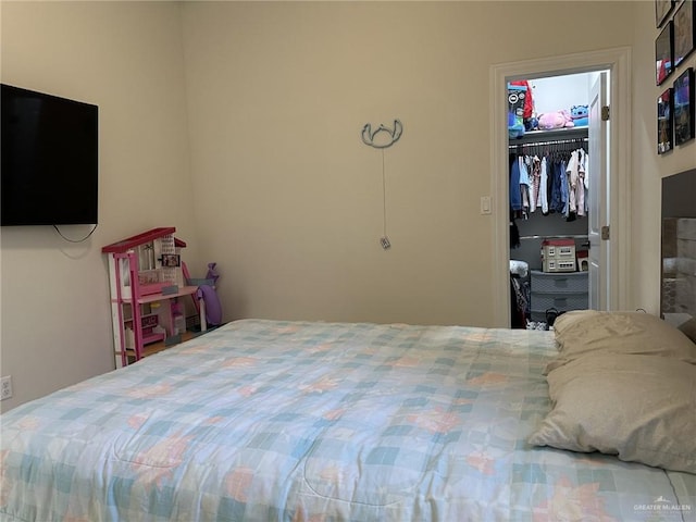 3108 E Kennedy Ave, Alton, TX 78573 - bedroom featuring a closet and a spacious closet