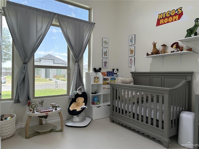 3108 E Kennedy Ave, Alton, TX 78573 - bedroom featuring a nursery area