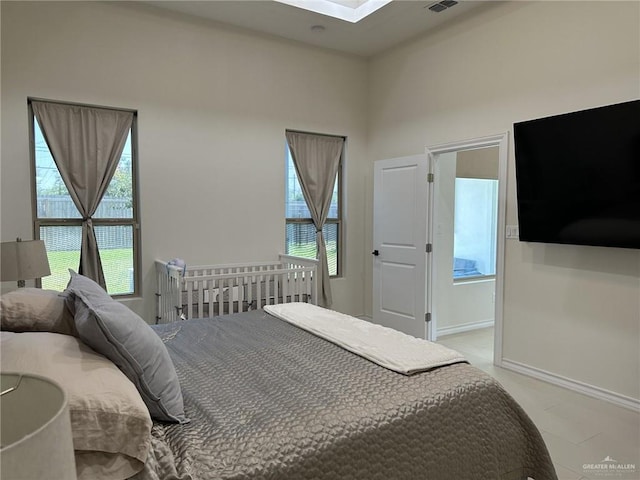 3108 E Kennedy Ave, Alton, TX 78573 - bedroom featuring a skylight and baseboards