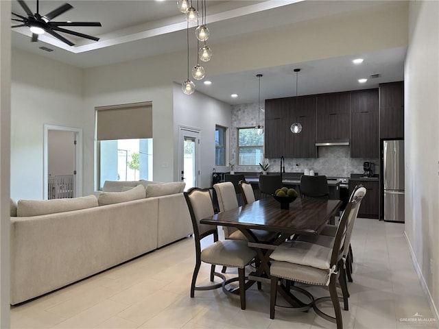 3108 E Kennedy Ave, Alton, TX 78573 - dining room with a towering ceiling, a ceiling fan, light tile patterned floors, and recessed lighting