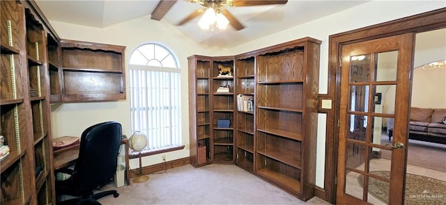 office space featuring baseboards, a ceiling fan, light colored carpet, lofted ceiling with beams, and french doors