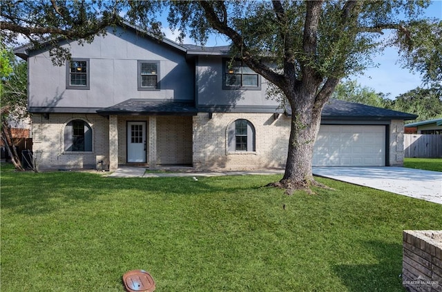 view of front facade featuring a garage and a front yard