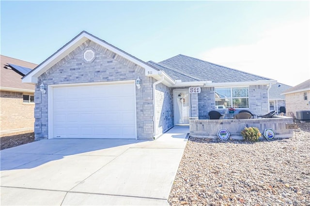 ranch-style home featuring a garage