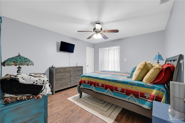 5213 Mile 8 1/2 Rd, Edinburg, TX 78541 - bedroom with wood finished floors and ceiling fan