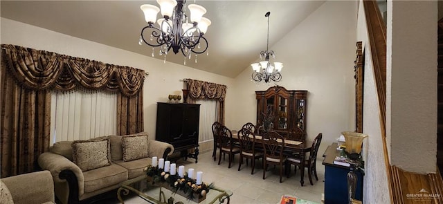 interior space with lofted ceiling, light tile patterned floors, and a chandelier