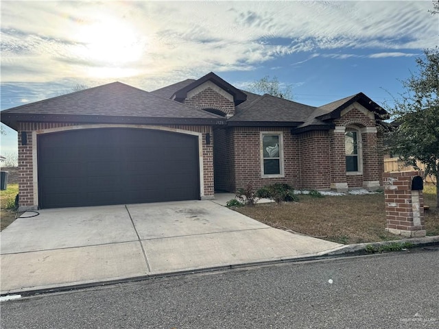 single story home with a garage