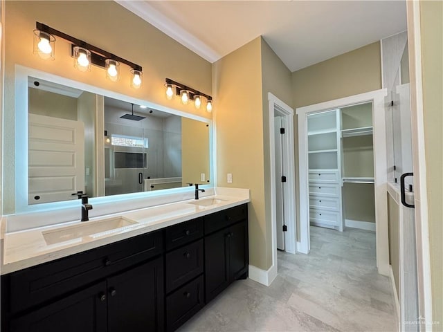 bathroom featuring vanity and a shower with shower door