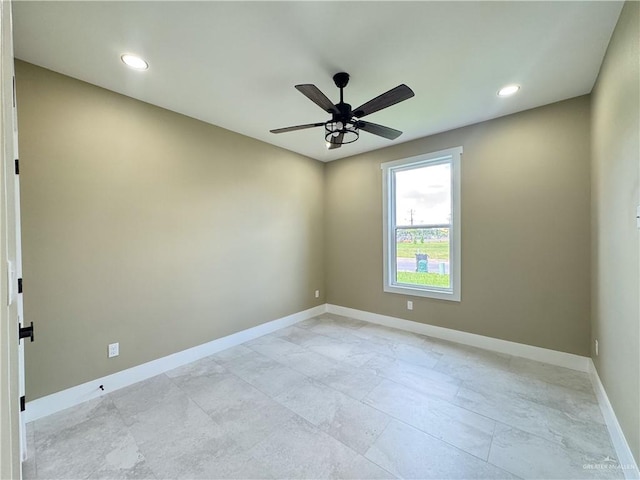 unfurnished room with ceiling fan