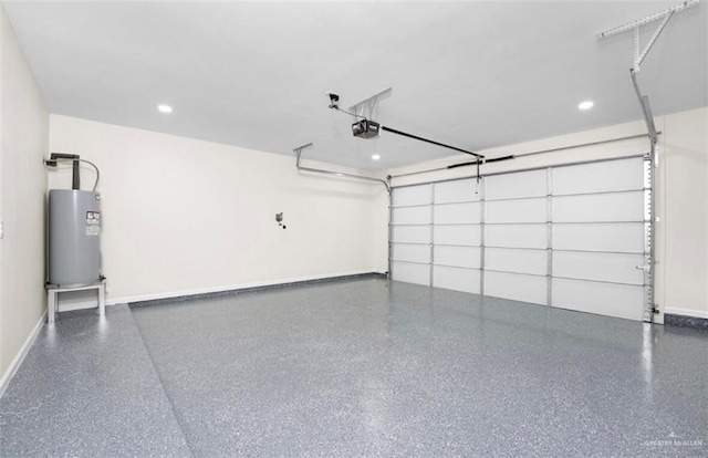 garage with water heater and a garage door opener