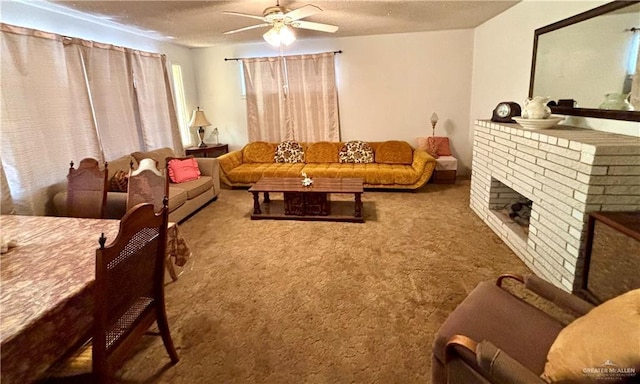 carpeted living area with a brick fireplace, ceiling fan, and a textured ceiling