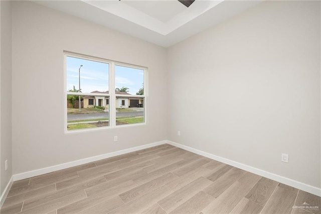 3513 E Adams Ave, Alton, TX 78573 - empty room with light wood-style flooring and baseboards