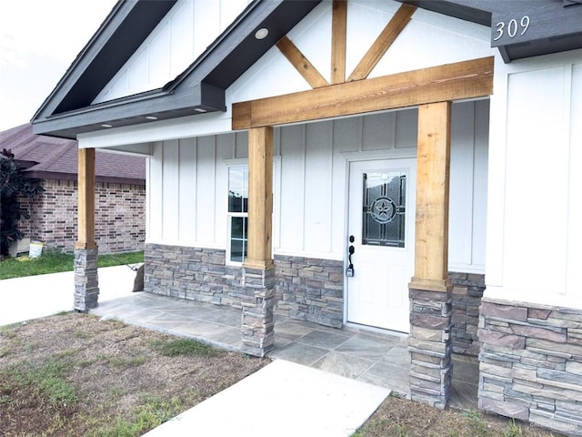 doorway to property with a porch