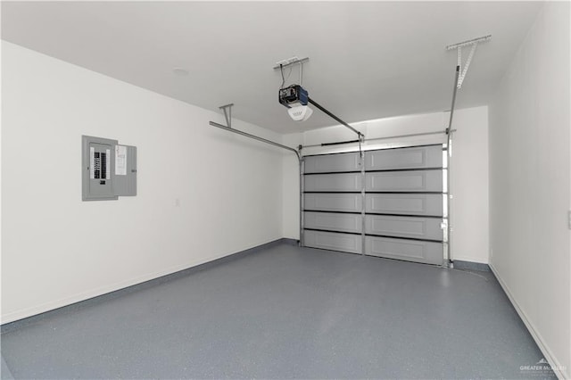 900 E 38th St, San Juan, TX 78589 - garage with baseboards, a garage door opener, and electric panel