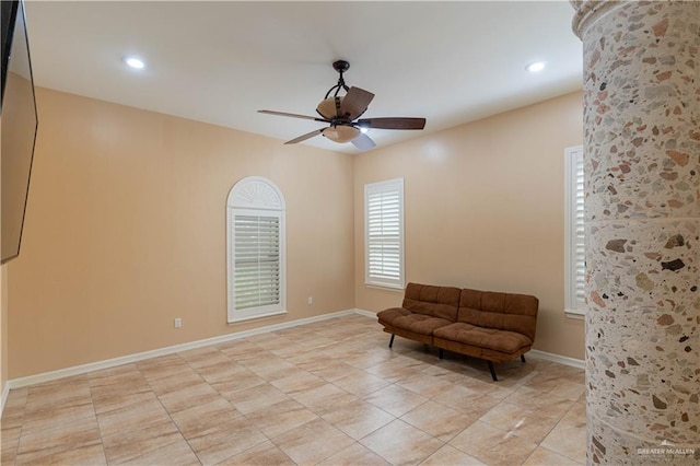 unfurnished room featuring ceiling fan