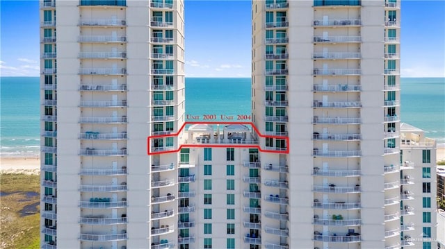 view of property with a water view