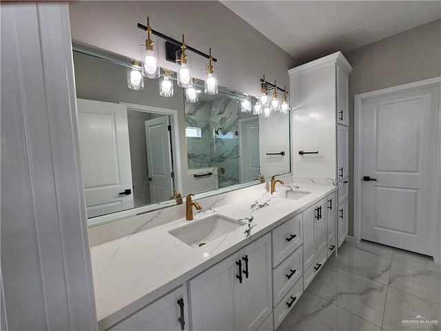 full bath featuring marble finish floor, a sink, a marble finish shower, and double vanity