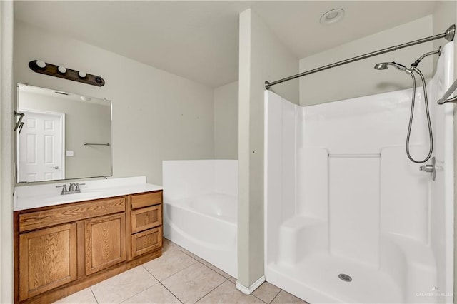 bathroom with vanity, independent shower and bath, and tile patterned flooring