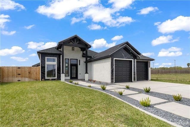 537 Kiwi St, Edinburg, TX 78541 - view of front of home featuring a garage, stucco siding, concrete driveway, and roof with shingles