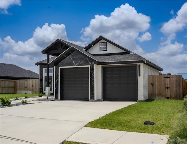 537 Kiwi St, Edinburg, TX 78541 - view of front of house with an attached garage, a shingled roof, driveway, and a gate
