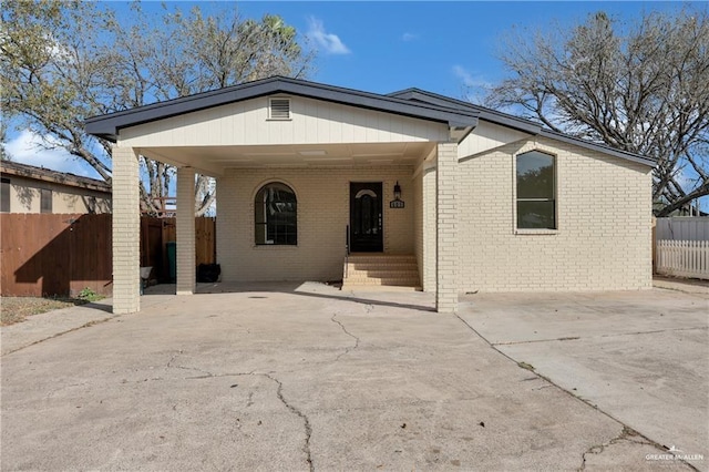 view of front of house featuring a carport