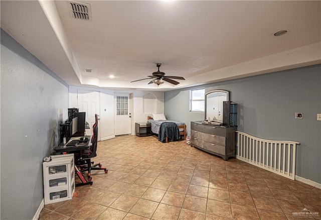 home office featuring ceiling fan and light tile patterned flooring