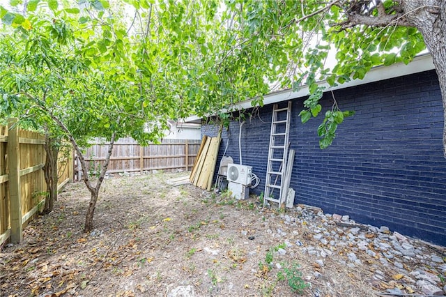 view of yard featuring ac unit