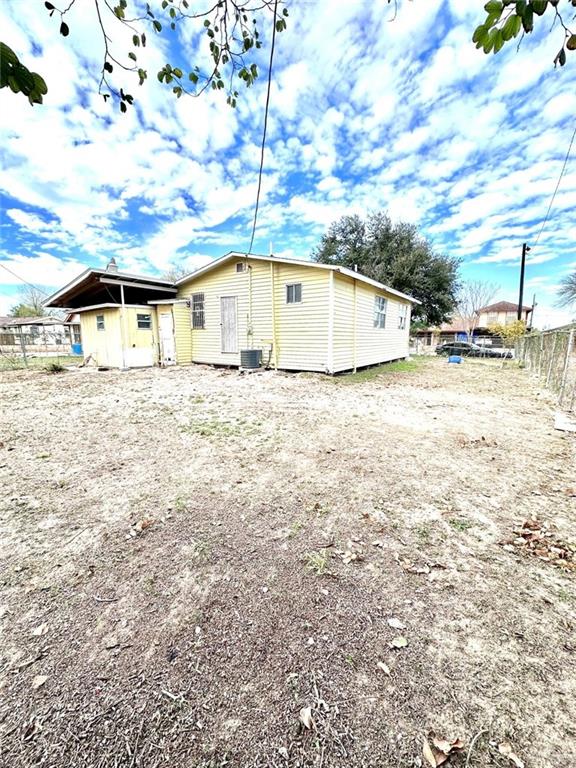 back of property with cooling unit