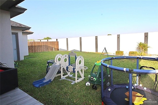 2209 David Ave, San Juan, TX 78589 - view of yard featuring a fenced backyard