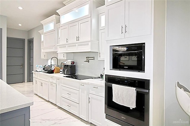 2209 David Ave, San Juan, TX 78589 - kitchen with oven, a sink, glass insert cabinets, marble finish floor, and black electric stovetop