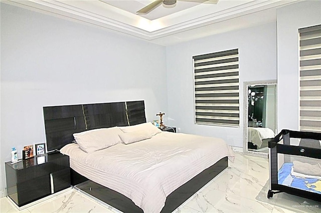 2209 David Ave, San Juan, TX 78589 - bedroom with a tray ceiling and marble finish floor