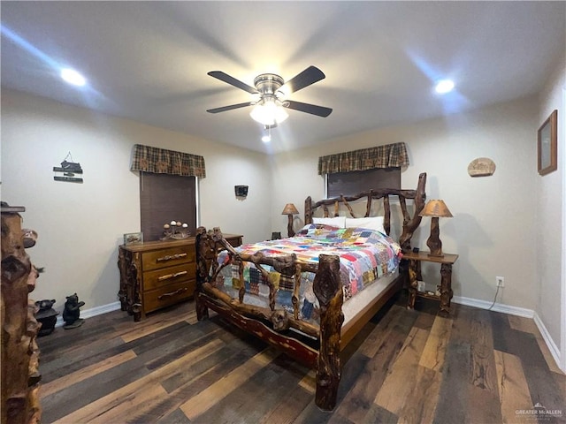 bedroom featuring ceiling fan and dark wood-type flooring