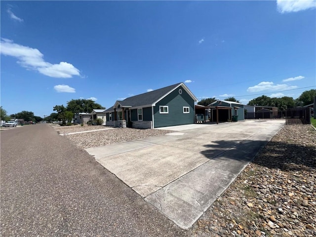 view of front of house featuring a carport