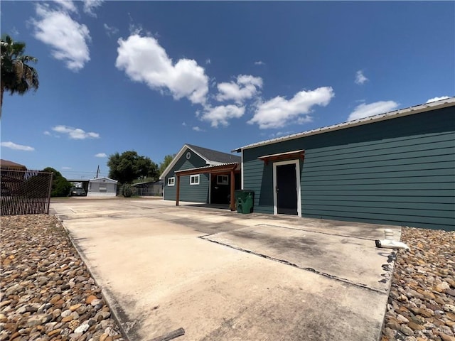 105 Lampshire Ln, Mission, TX 78572 - exterior space featuring driveway and a patio area