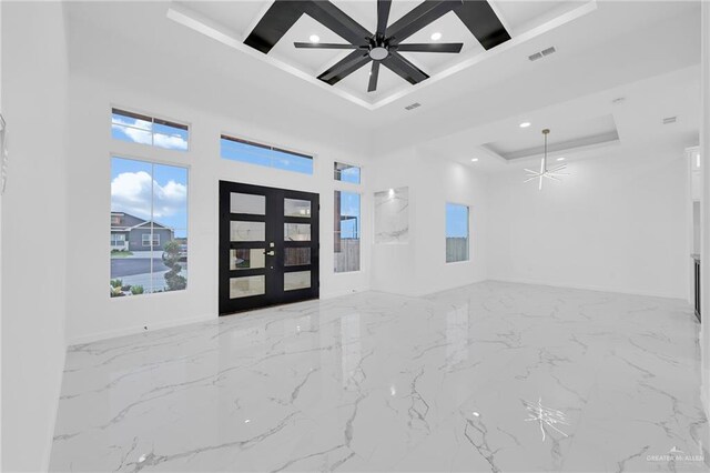 2208 Trinity St, Donna, TX 78537 - entrance foyer with marble tiled floors, a raised ceiling, recessed lighting, coffered ceiling, and ceiling fan