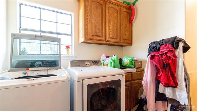 4706 N Trosper Rd, Palmhurst, TX 78573 - washroom featuring cabinet space, washing machine and dryer, and plenty of natural light