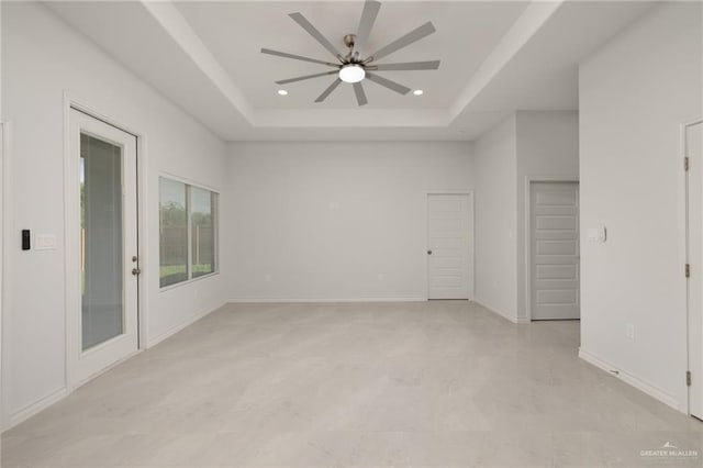 9206 N 25th St, Mcallen, TX 78504 - empty room with a raised ceiling, a ceiling fan, and recessed lighting