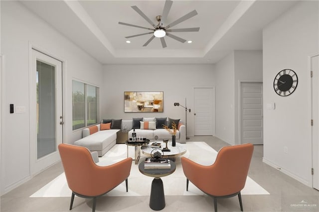 9206 N 25th St, Mcallen, TX 78504 - living room with a ceiling fan, a raised ceiling, and recessed lighting