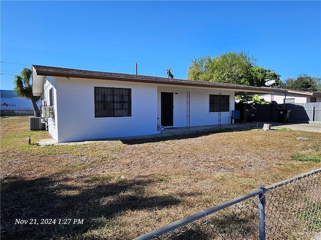 single story home with central AC unit