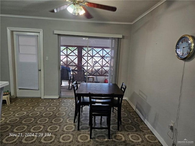 dining room featuring ceiling fan and crown molding