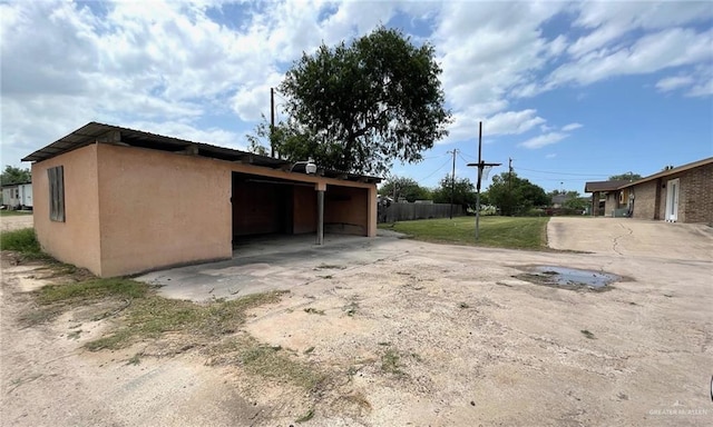 5307 Fm 493rd Rd, Donna, TX 78537 - view of outdoor structure featuring a carport and driveway