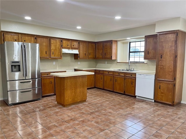 5307 Fm 493rd Rd, Donna, TX 78537 - kitchen with stainless steel fridge with ice dispenser, dishwasher, brown cabinets, and recessed lighting