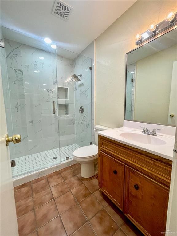 5307 Fm 493rd Rd, Donna, TX 78537 - full bath featuring a marble finish shower, vanity, and tile patterned flooring