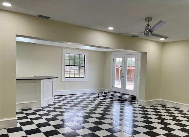 5307 Fm 493rd Rd, Donna, TX 78537 - empty room with tile patterned floors, a ceiling fan, plenty of natural light, french doors, and recessed lighting