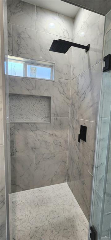 full bath featuring a stall shower